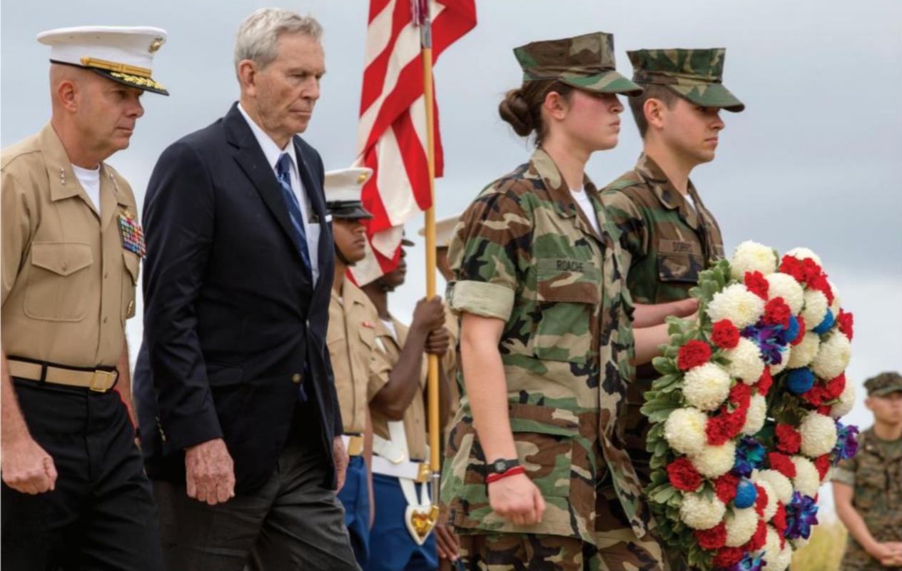 (From left) U.S. Marine Lt. Gen. David H. Berger, retired Marine Corps Lt. Gen. Norman Smith, and members of the Young Marines approach an Iwo Jima memorial to participate in a wreath-laying presentation as part of the 72nd Reunion of Honor ceremony, March 25, 2017. This event presented the opportunity for the U.S. and Japanese people to mutually remember and honor thousands of service members who fought and died on the hallowed grounds of Iwo Jima. U.S. MARINE CORPS PHOTO BY LANCE CPL. BROOKE DEITERS